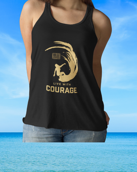 Girl in a black tank top with a gold surfing girl and wave on the front
